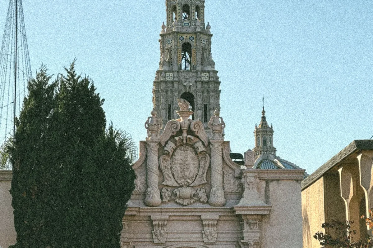 Ornate Balboa Park architecture framed by trees